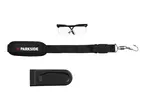 Safety glasses, a black strap with a padded section, and a black plastic tool cover.