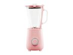 Pink blender with a glass jug and a silver control dial on a white background.