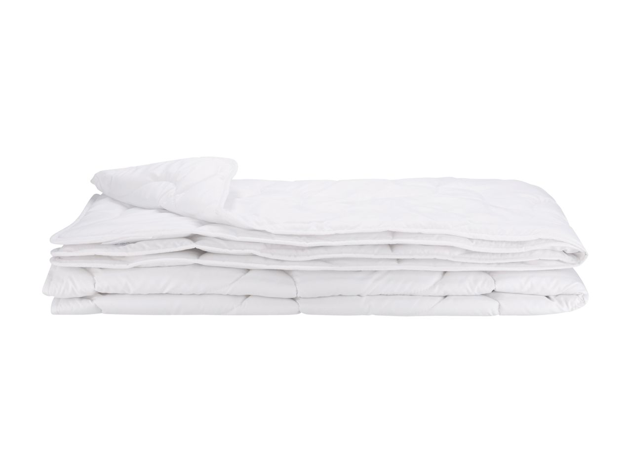 A neatly stacked set of white bedding, including a pillowcase and flat sheet.