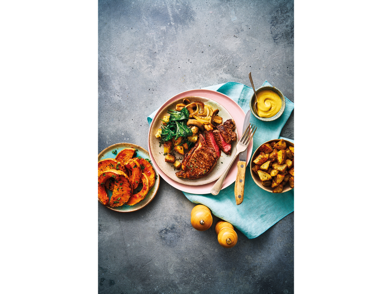Steak, roasted pumpkin and potatoes, mustard sauce.