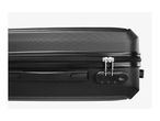 Close-up of a black suitcase with a textured surface, zipper, and combination lock.
