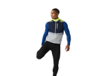 A young man stretching in a Crivit running jacket and tights.