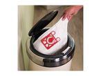 A hand disposes of a used vacuum cleaner bag into a bin.