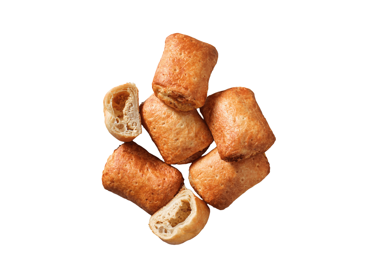 Kuhjas kuldsed lehttaignapirukad täidisega, üks neist on pooleks lõigatud.