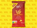 Опаковката на Snack Day показва XXL пакетче с Butter Twists със сол.