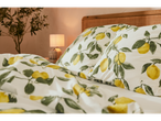 Lemon-print bedding: pillows and duvet cover in a fresh design.