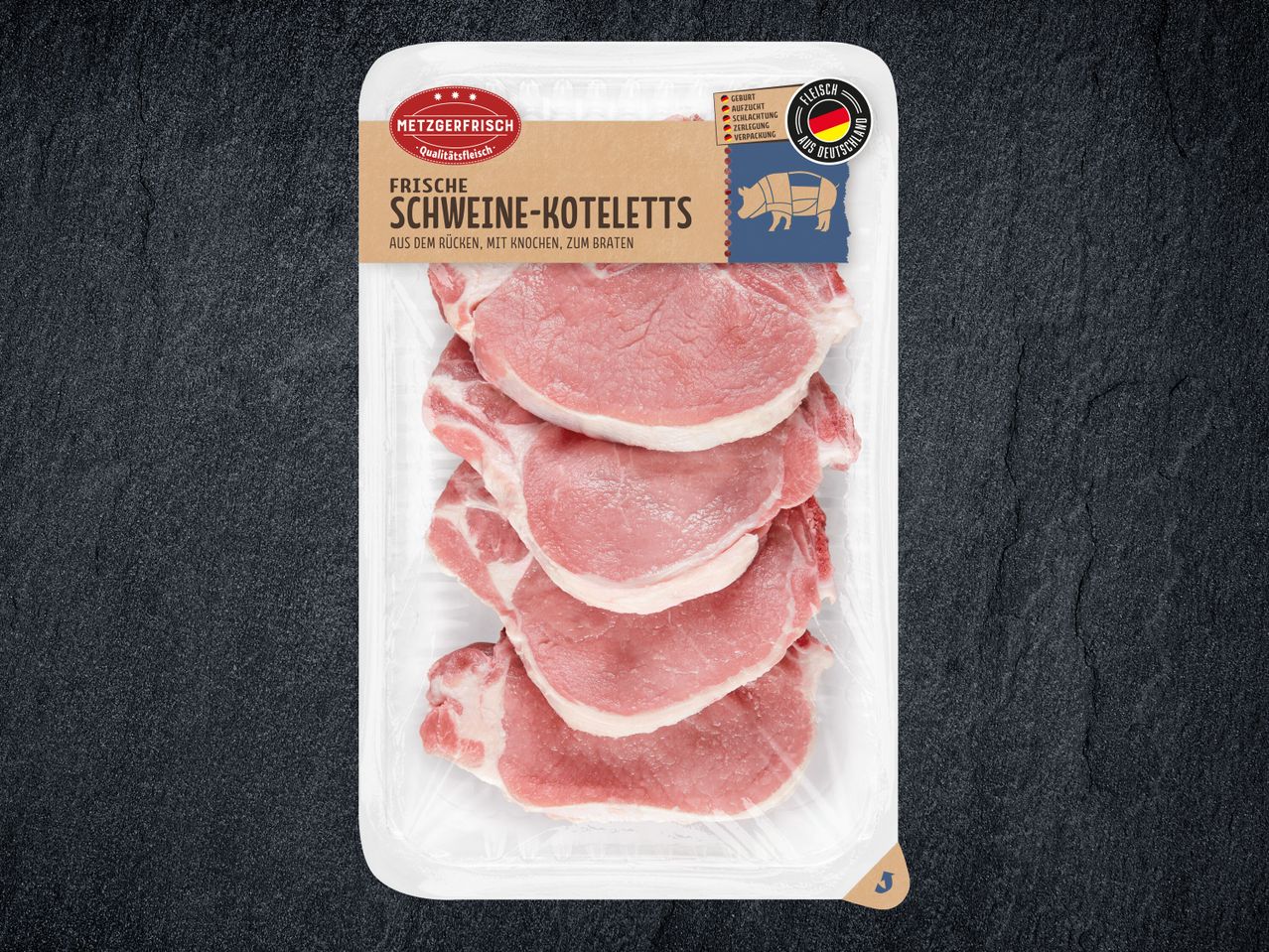 Frische Schweinekoteletts in Verpackung.