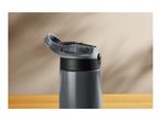 Close-up of a dark grey water bottle with a black and grey flip-top lid.