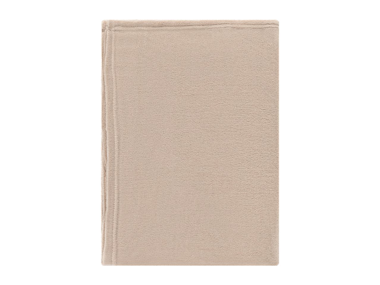 Beige plush blanket or throw folded neatly