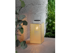 LIVARNO home LED Solar Lantern with a decorative pattern, casting light on a textured wall and surface.