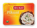 Buko Pikant flødeost med løg og krydderurter på rugbrød.