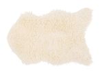 Soft cream-colored faux sheepskin rug