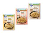 Tre pakker spätzle med forskellige saucer: ost, løg og champignon.