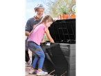 Grandfather and granddaughter using a LIVARNO home 280L Garden Storage Box.