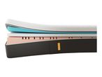A cross-section of an Emma mattress, revealing its multiple layers of foam and fabric.