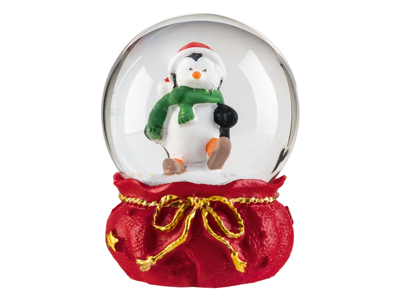 Sniego gaublys su pingvinu Kalėdų Senelio kepure ir žaliu šaliku, ant raudono pagrindo.