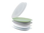 Stackable, oval-shaped containers with lids, possibly for food storage or cosmetics.