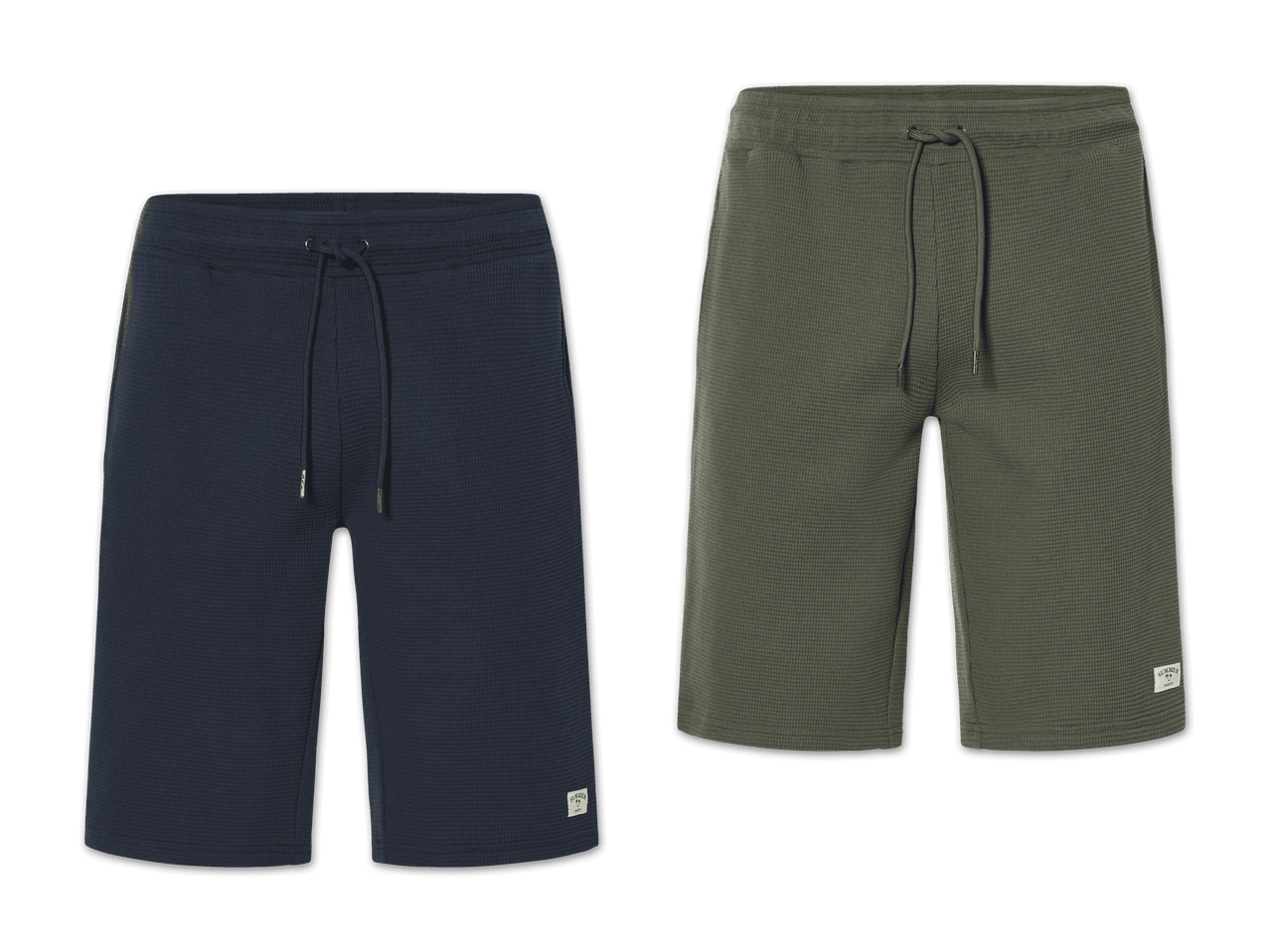 Zwei New Balance Shorts in Dunkelblau und Olivgrün.