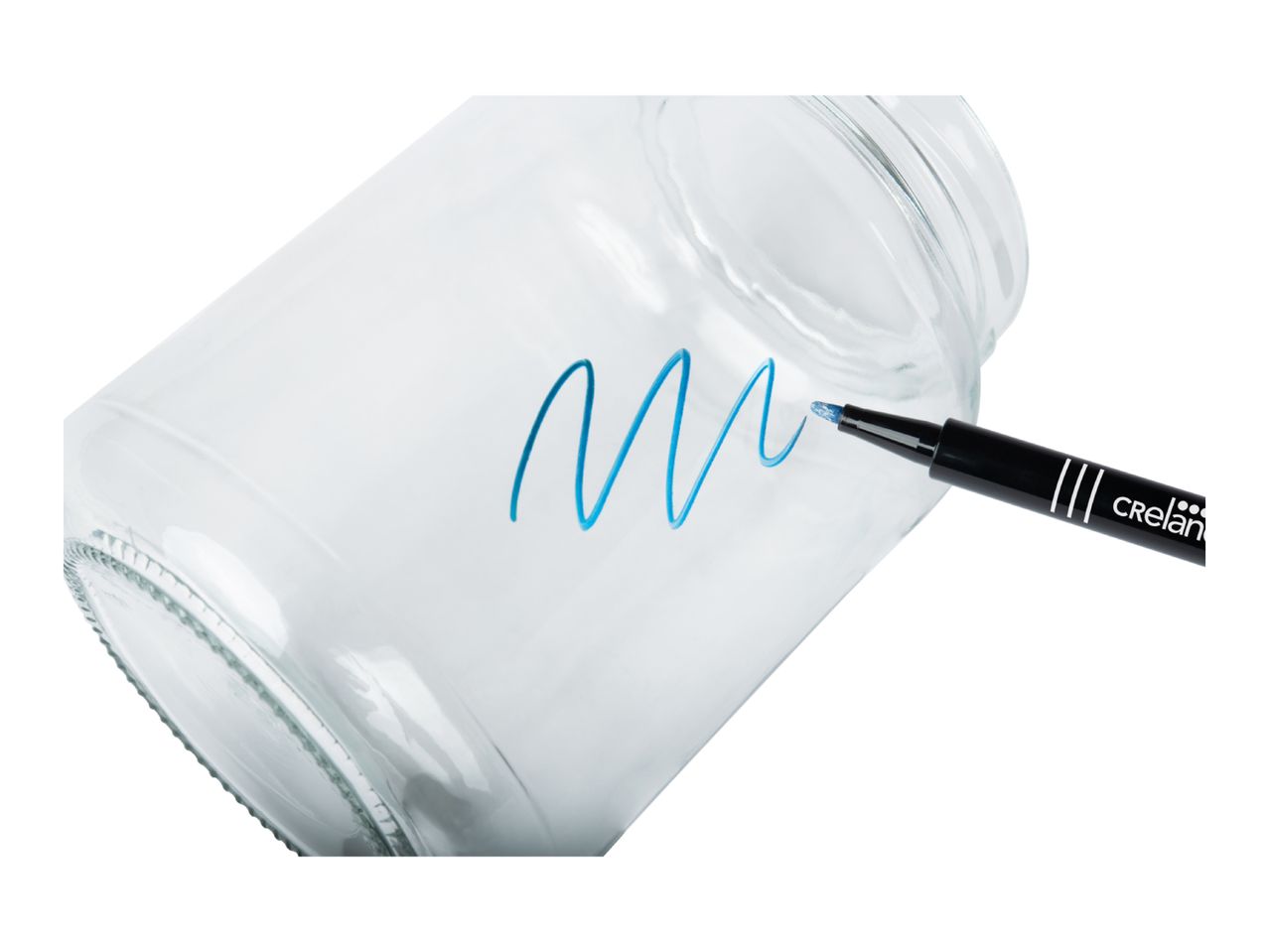 A blue marker drawing a wavy line on a clear glass jar.