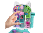 Gabby's Dollhouse Polly Pocket playset with a hand interacting with a doll and elevator.