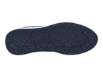 Bottom view of a dark blue athletic shoe sole with a geometric pattern.