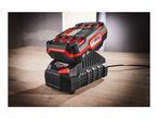 A black and red power tool battery charging on a black charger, with a power cord.