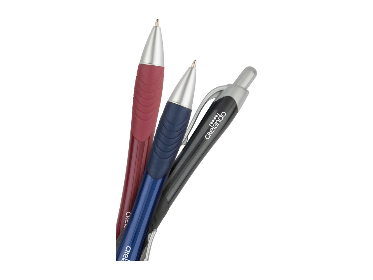 Three ballpoint pens in red, blue, and black with silver accents.