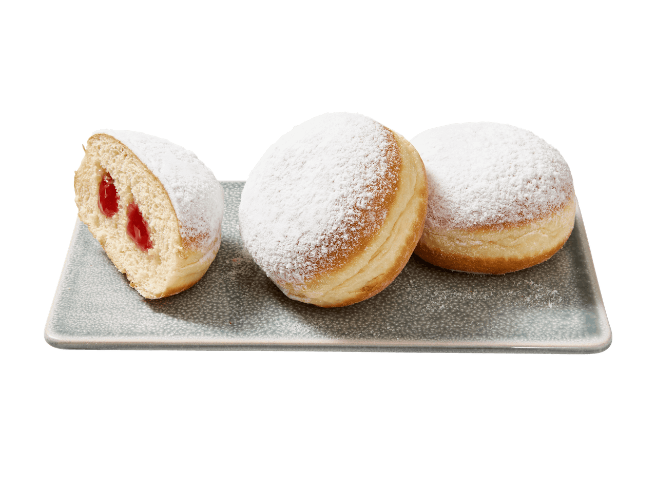 Trois beignets à la confiture, dont un coupé en deux, sur un plateau rectangulaire.