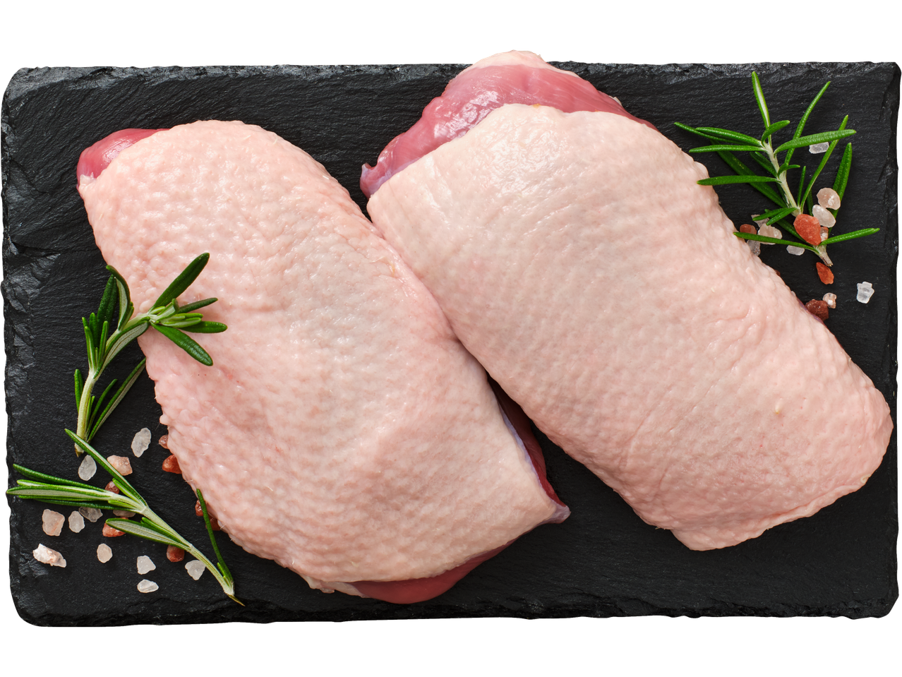 Svaigas pīles krūtiņas filejas ar ādu, rozmarīnu un rozā sāli uz šīfera dēļa