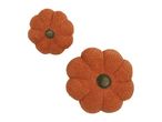 Two orange pumpkin-shaped decorative pillows with green stems.