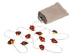 Ekollonformade LED-julbelysning med tygpåse.