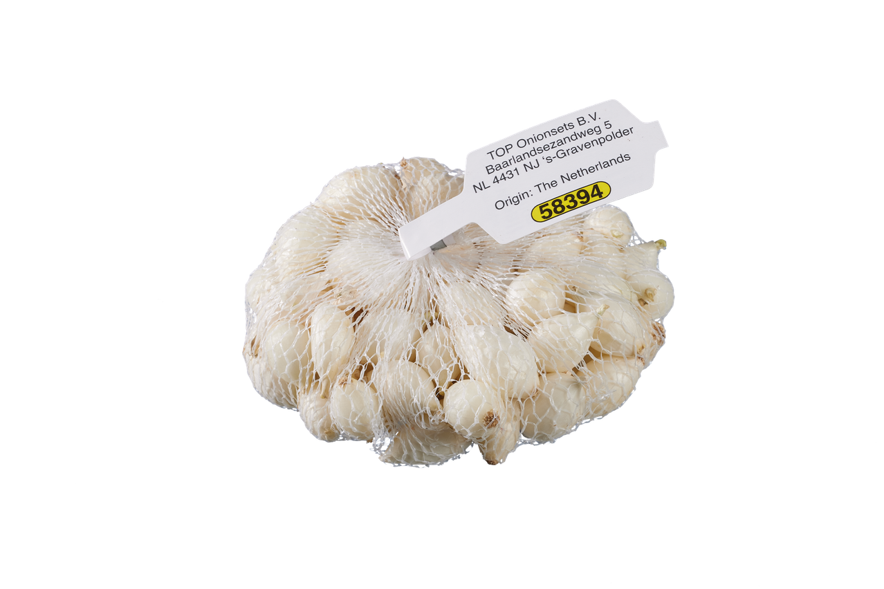 A mesh bag of white onion bulbs with a label indicating origin from The Netherlands.