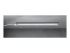 An under-cabinet LED light bar with a power cord, mounted on a gray wall.