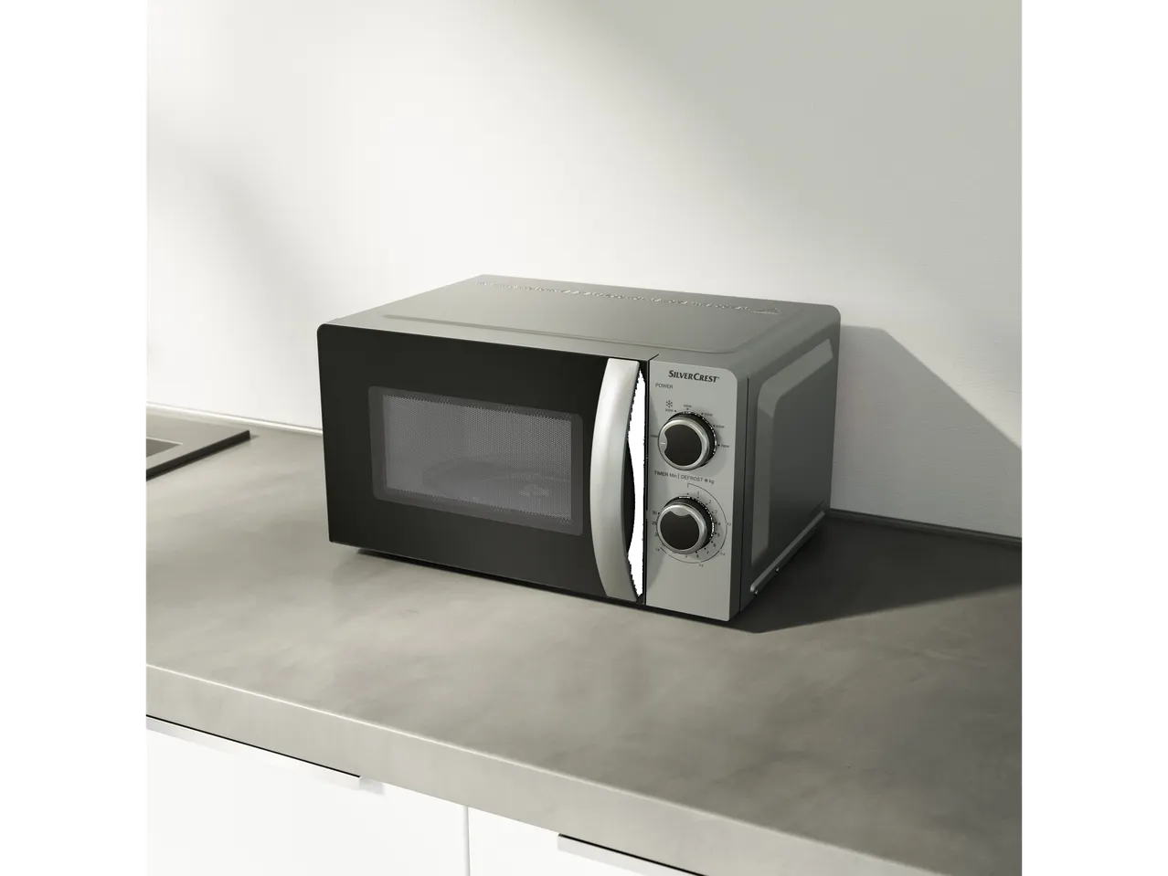 SilverCrest microwave on a kitchen counter.