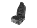 Black car seat covers with integrated backrest and headrest.