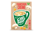 Verpakking van champignoncrèmesoep met een groene mok, champignons en croutons.