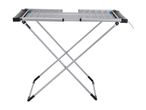 Silver clothes drying rack with an X-shaped frame and black accents.