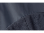 Pantaloni de noroi și nisip Lupilu®: Prim-plan cu material impermeabil și căptușeală din fleece.