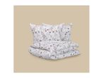 Floral patterned bedding set with two pillows and a folded duvet