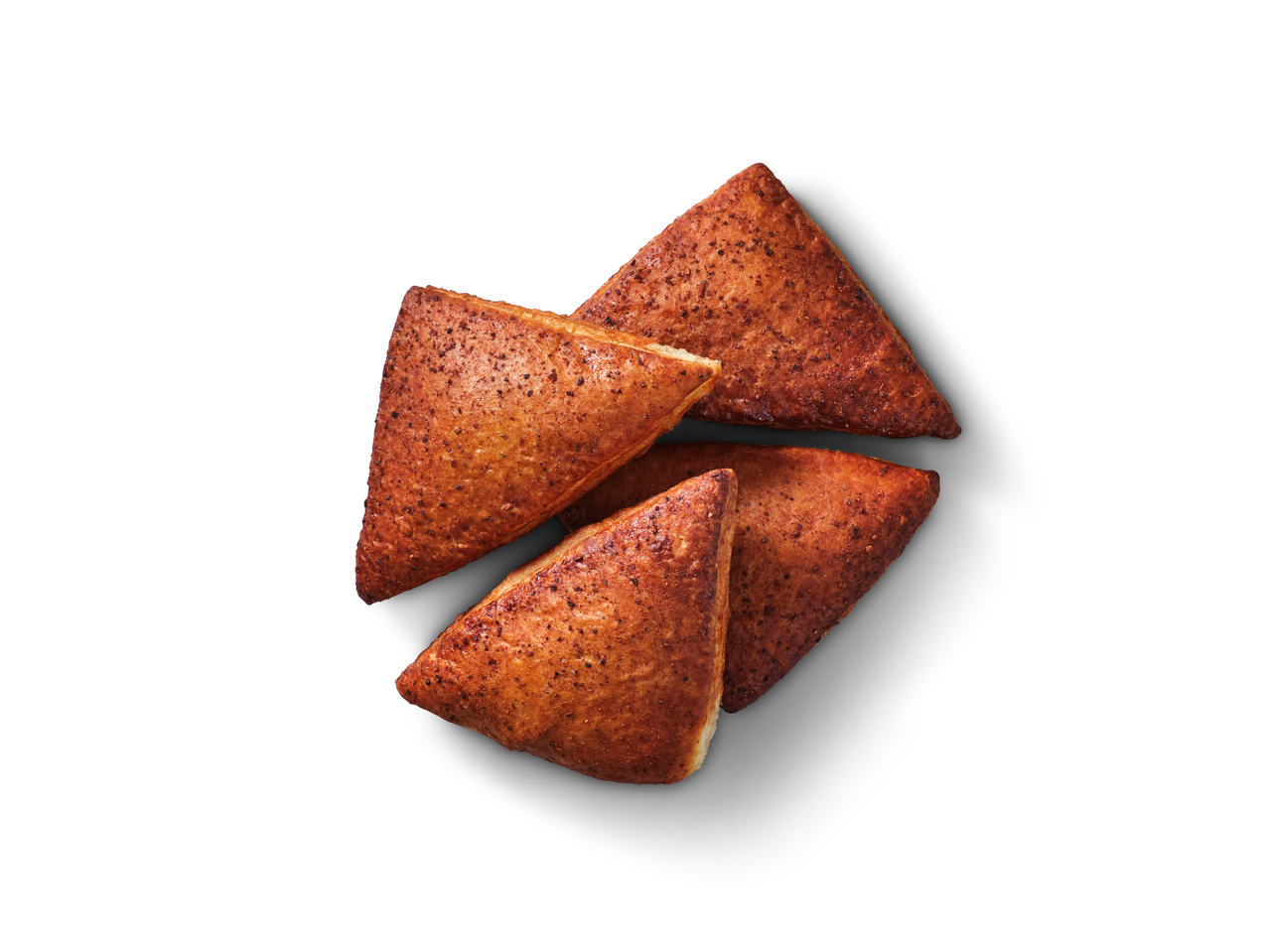 Neli kolmnurkset õuna- ja kaneelipirukat