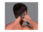 Man trimming the hair on the back of his neck with a hair clipper.