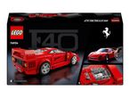 Red toy car box with a model car, engine detail, and logo.