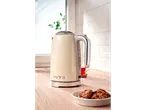 Silvercrest® cream electric kettle with the number '1973' on it, on a wooden countertop.