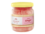 Jar of Japanese style sliced, coloured, and pickled ginger with a yellow lid.
