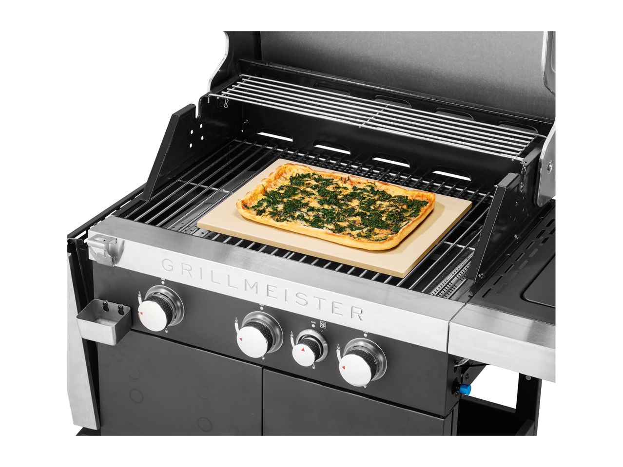 Grillmeister grill with pizza on a baking stone.
