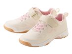 Cream children's sneakers with pink accents.