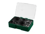 Hole saw set with various sizes of saw blades and drill bits in a green and clear case.