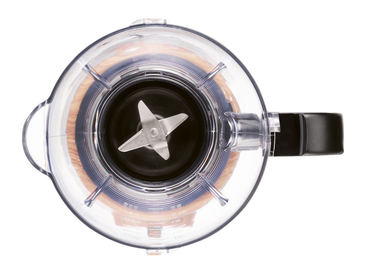 Overhead view of a clear blender jug with a four-blade assembly at the bottom.