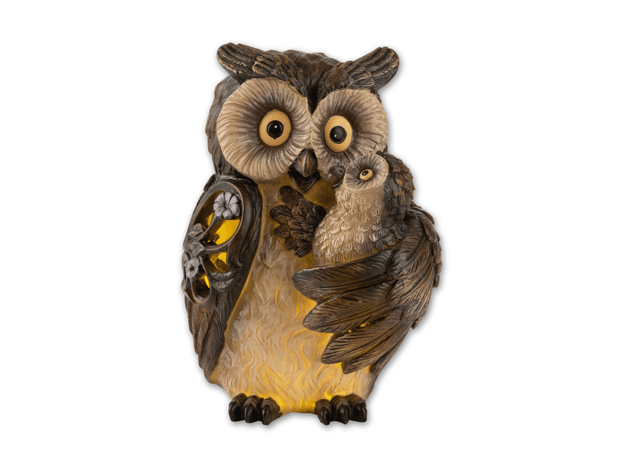 Eine Eulenfigur mit einem Baby-Eulen-Design, das ein warmes Licht ausstrahlt.