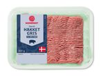 Pakke med 300g hakket gris med 14-18% fedt, mærket 'Danish Hakket Gris' og det danske flag.